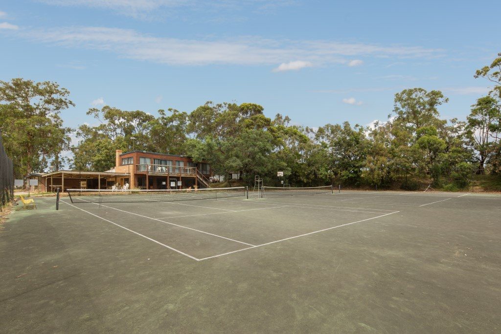 Four tennis courts and two basketball courts ideal for large, sporting groups and active families