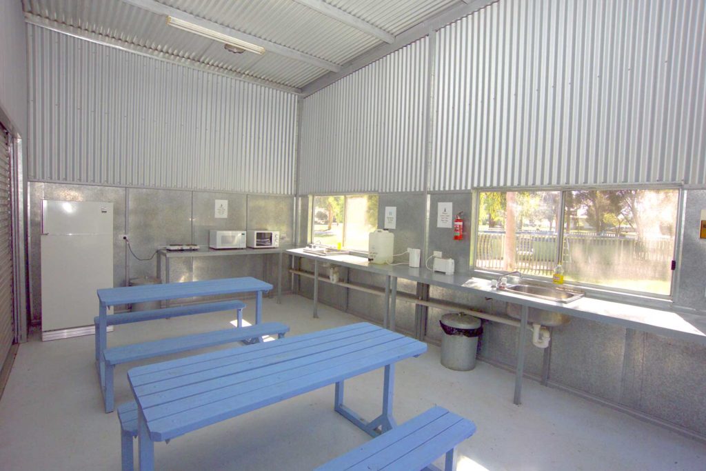 A sheltered camp kitchen catering for campers and groups