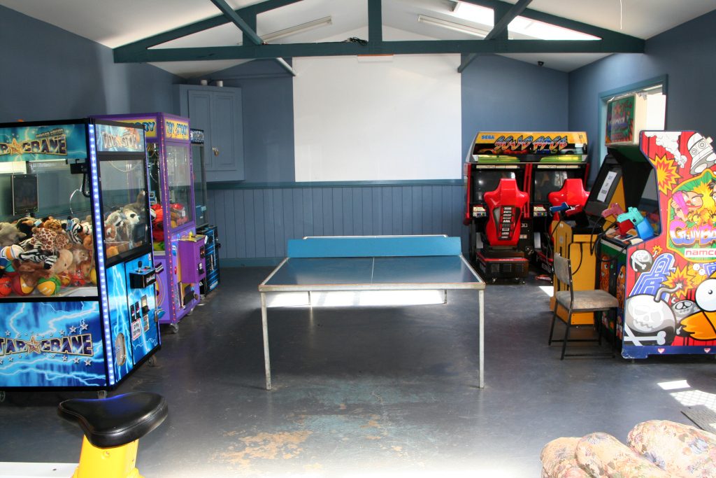 Quality down time in the games room with archade games and a tennis table