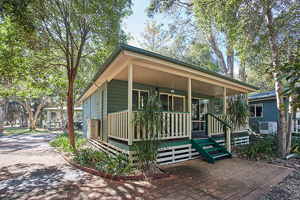 Generous verandah and deck on the Shearwater Cabin at Budgewoi Holiday Park