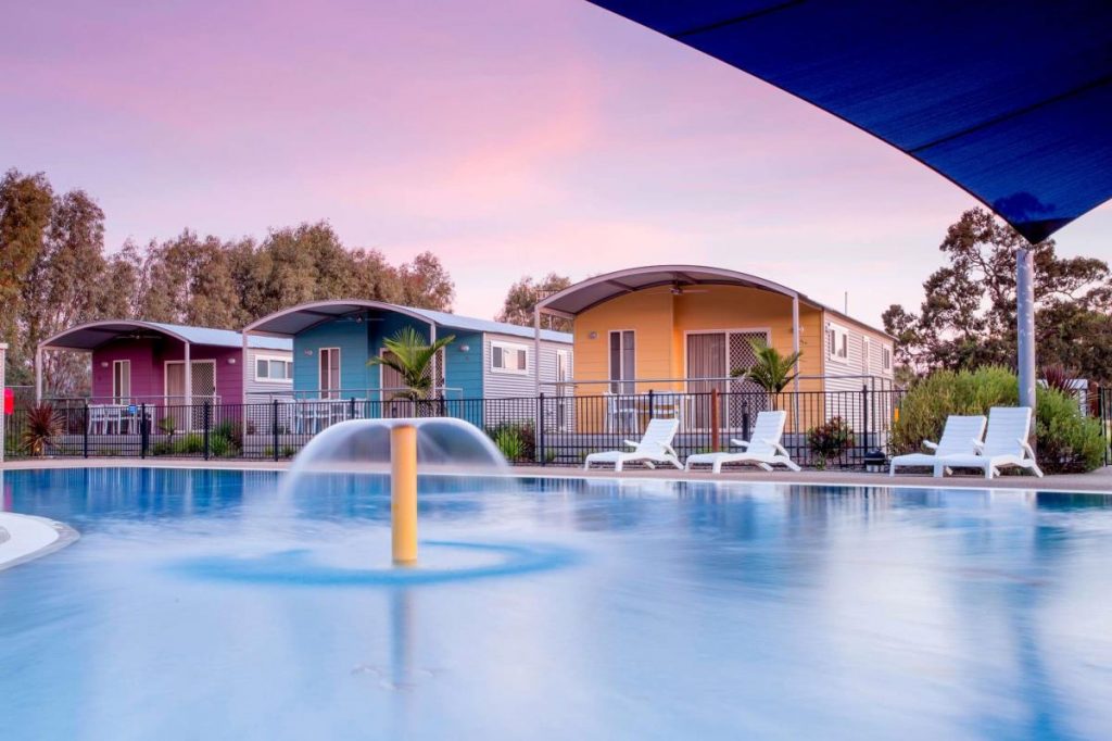 Family-size cabins facing the beautiful water splash park at BIG4 Deniliquin Holiday Park