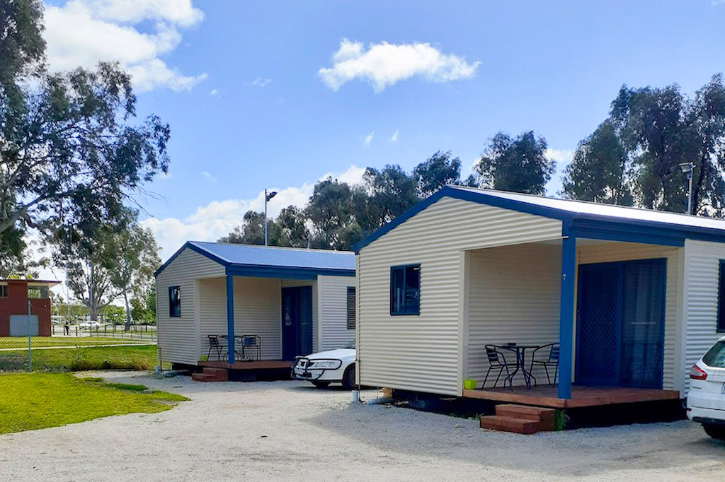 Neat cabins with their own verandahs at the Kerang Caravan & Tourist Park