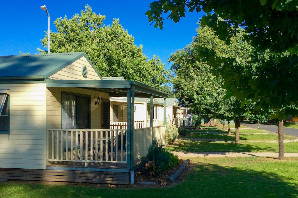 Shaded cabins for ultimate comfort at Lake Anderson Caravan Park in Victoria's beautiful high country