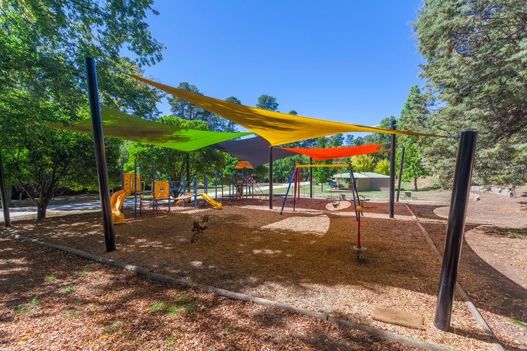 Kids play among nature at the NRMA Bright Holiday Park
