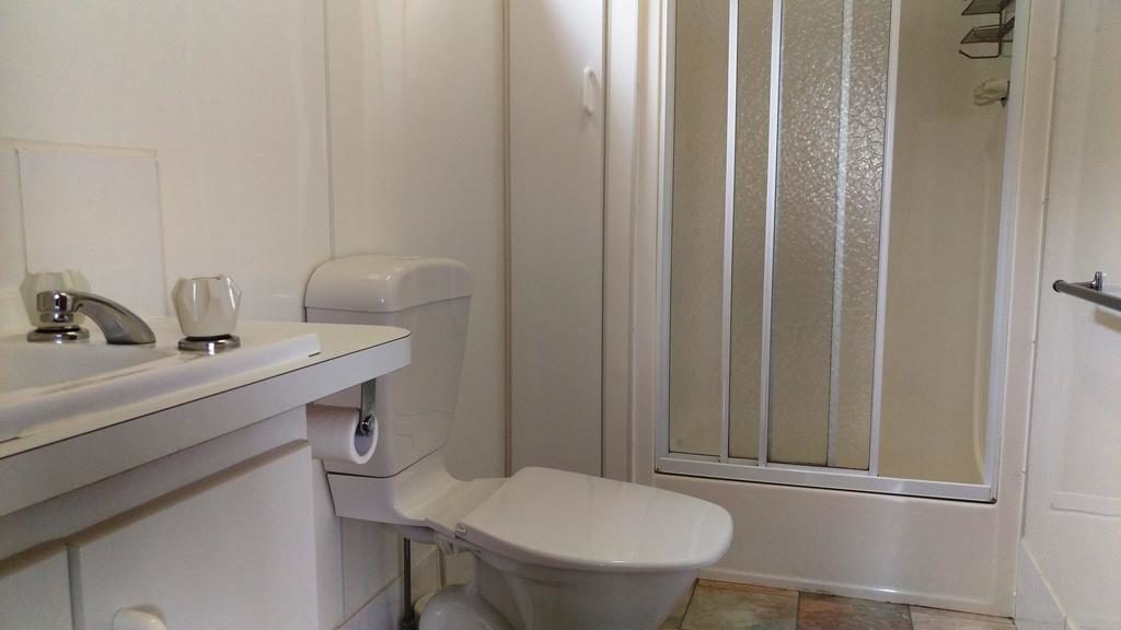 private bathroom amenities within the clean Prom Central Caravan Park cabins