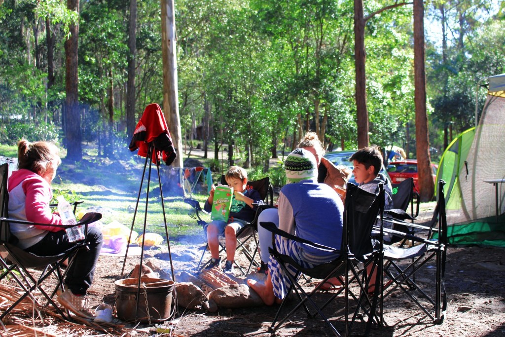 Thunderbird Park caravan park patrons enjoying a campfire on their site